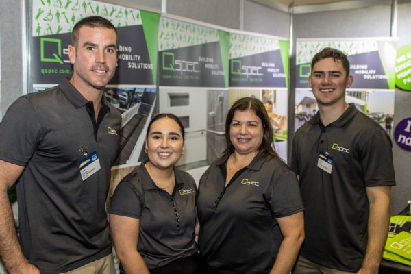 A group of exhibitors smiling at camera at ATSA Expo Brisbane 2022
