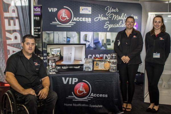 VIP Access exhibitors smiling at camera at ATSA Expo Brisbane 2022